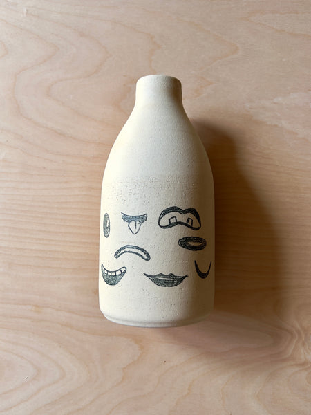 Medium white vase with doodle style mouths painted in black ink