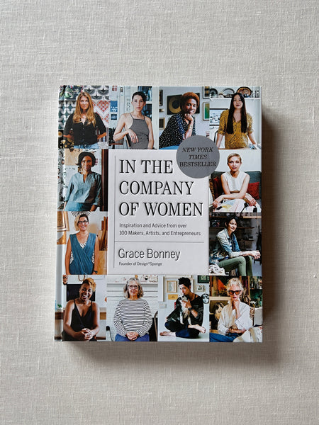 Cover of the book "In The Company of Women" by Grace Bonney. The cover has a collage of women on it
