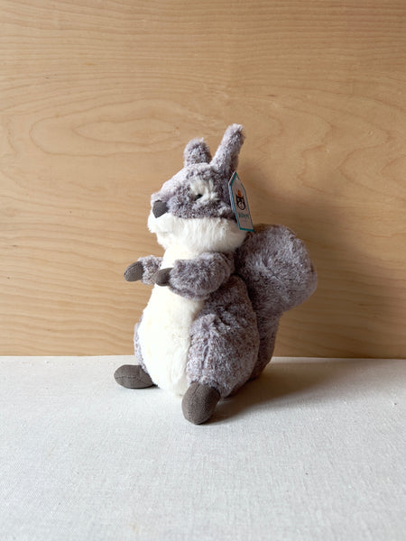Small grey and white stuffed squirrel