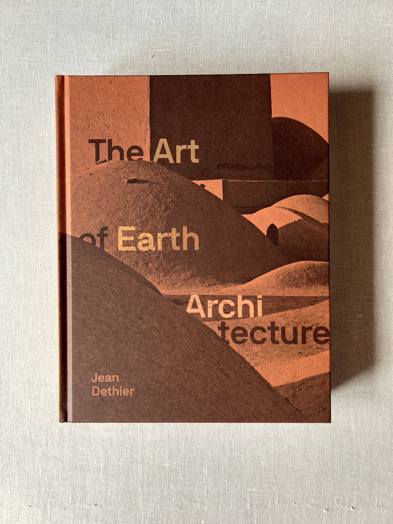 Brown cover of the book "The Art of Earth Architecture" by Jean Dethier showing different shapes