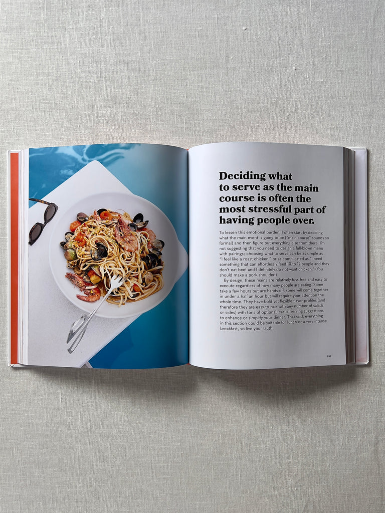 The book "Nothing Fancy" opened to a page detailing a noodle dish.