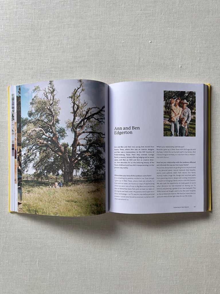 The book "Al Fresco" opened to a page showcasing a large tree on the left page and paragraphs on the right.