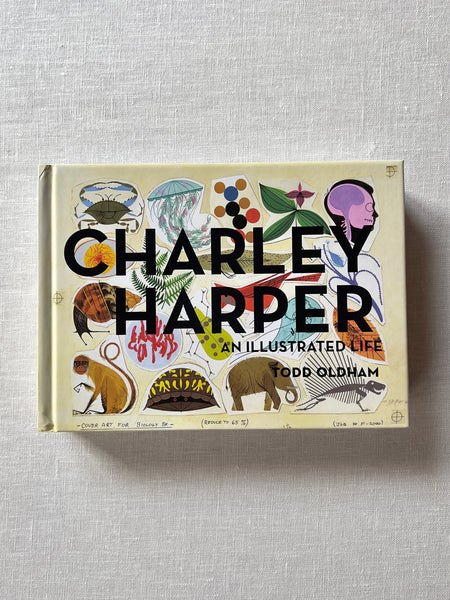 A cover of the Book "Charley Harper" by Todd Oldham. The cover is various colorful illustrations of animals, fossils, flowers, plants and more. Additional text reads "An Illustrated Life."