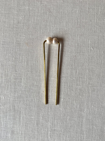 U shaped bronze hair fork with two pearls at the top