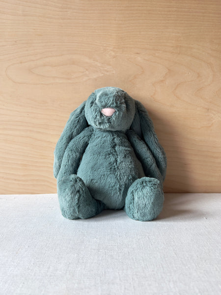 Stuffed forest green bunny