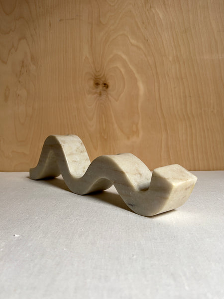 wavy horizontal candle holder carved from marble
