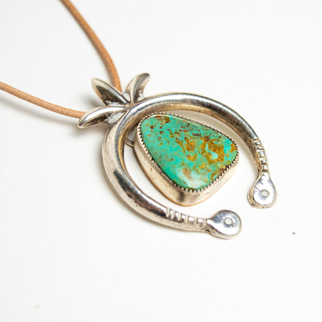 naja necklace with turquoise in the middle