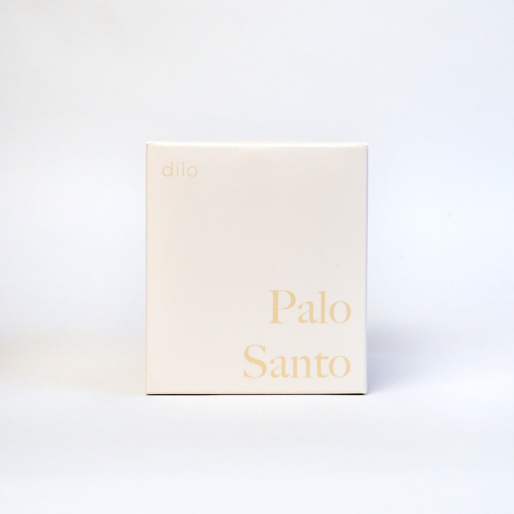 small white box reading "palo santo."
