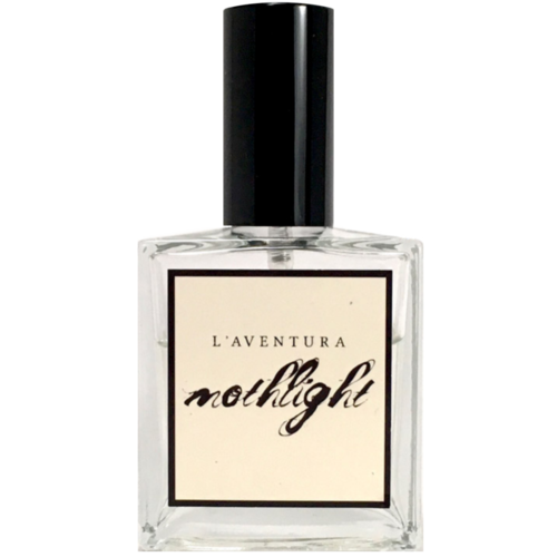 Square glass perfume bottle with a black top. the glass has a label reading "Mothlight."