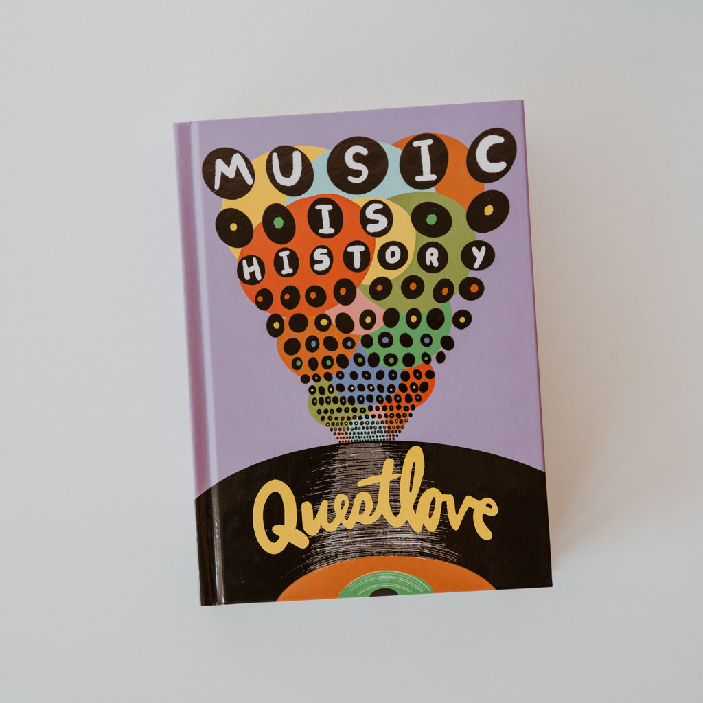 A Cover of the book "Music is History" by questlove. The cover is purple with colorful dots shooting out of a record.