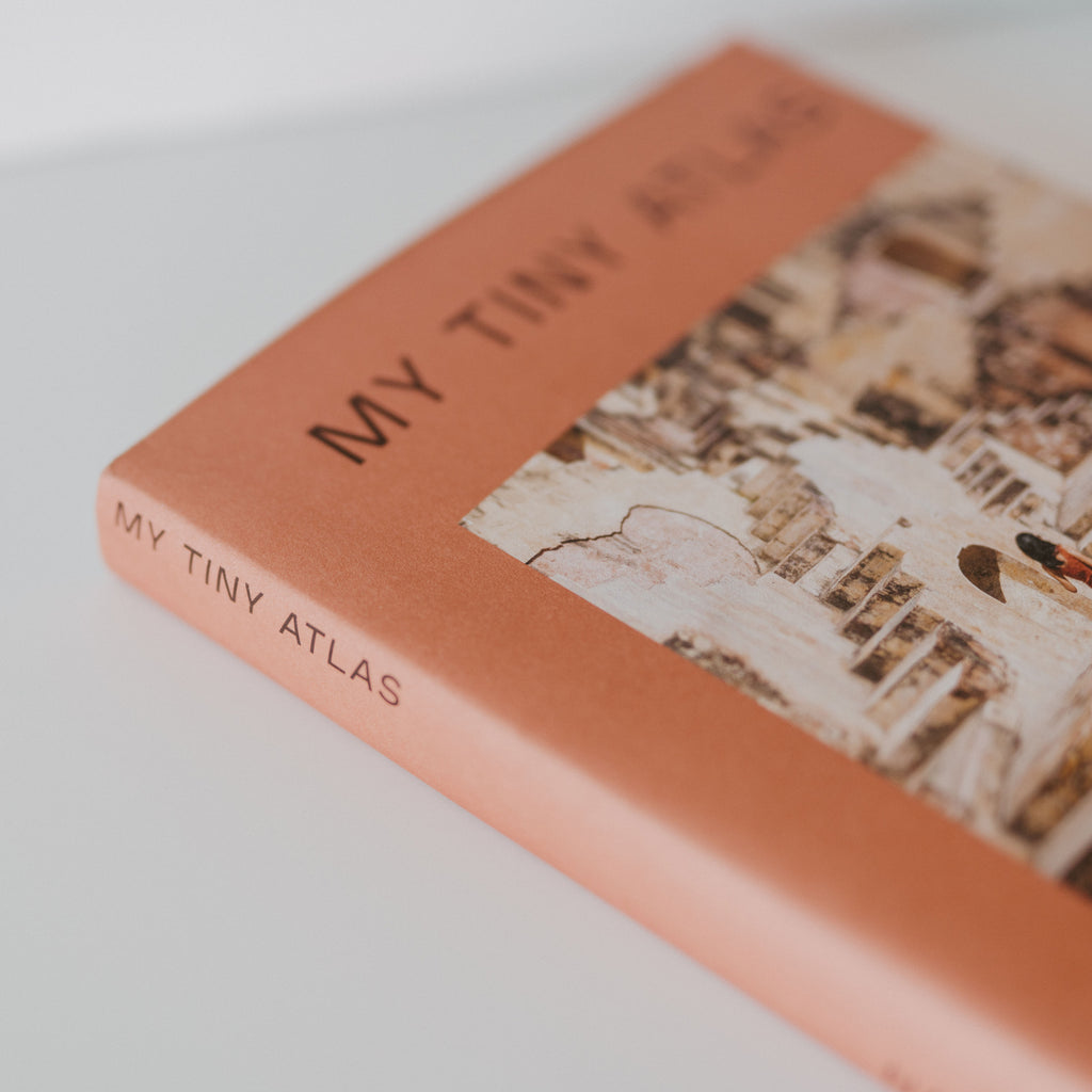 Cover of the book "My Tiny Atlas" by Emily Nathan.