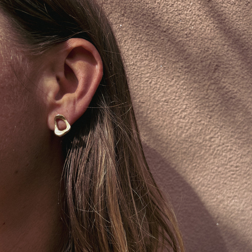 Organic oval shaped bronze earrings.